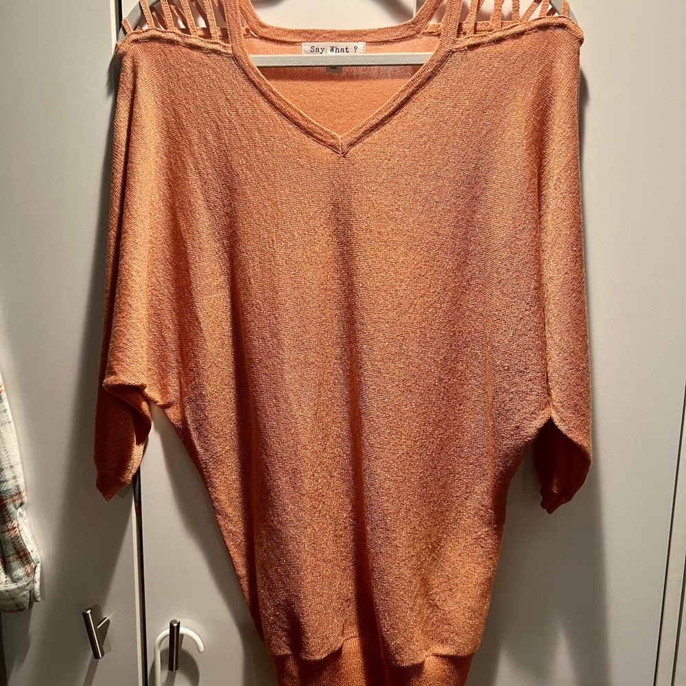 Say What? 3/4 sleeve, coral glitter shirt.